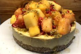 Tropical cheesecake with a ginger base, topped with fresh fruit