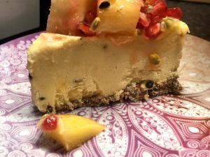 Slice of tropical cheesecake