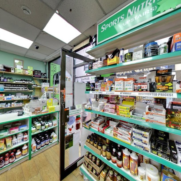 Inside the Pumpernickel health shop, well-stocked supplement shelves, Bedford