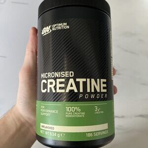 Container with Optimum Nutrition logo and Creatine Powder Unflavored 634g label