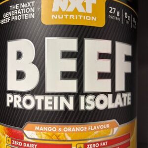 Container of NXT Nutrition Beef Protein Isolate Mango and Orange 1.8kg